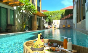 Floating Tray with Refreshments Inside Resort Pool – Luxury Vacation Experience