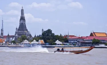 Wat Arun Temple with Riverside View in Bangkok, Thailand – Iconic Buddhist Landmark