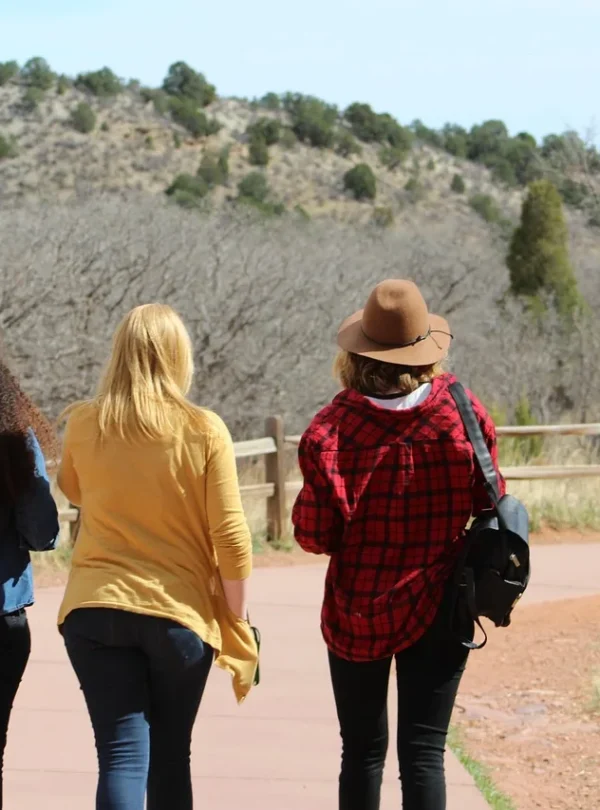 Traveler enjoying eco-friendly trip amidst nature