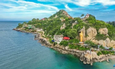 beach view with mountain and house thailand