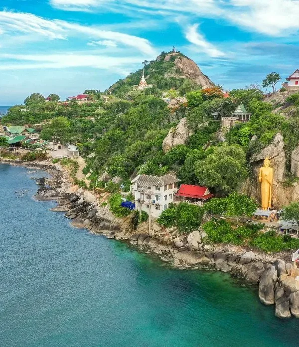 beach view with mountain and house thailand