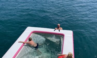 pool with yacht party