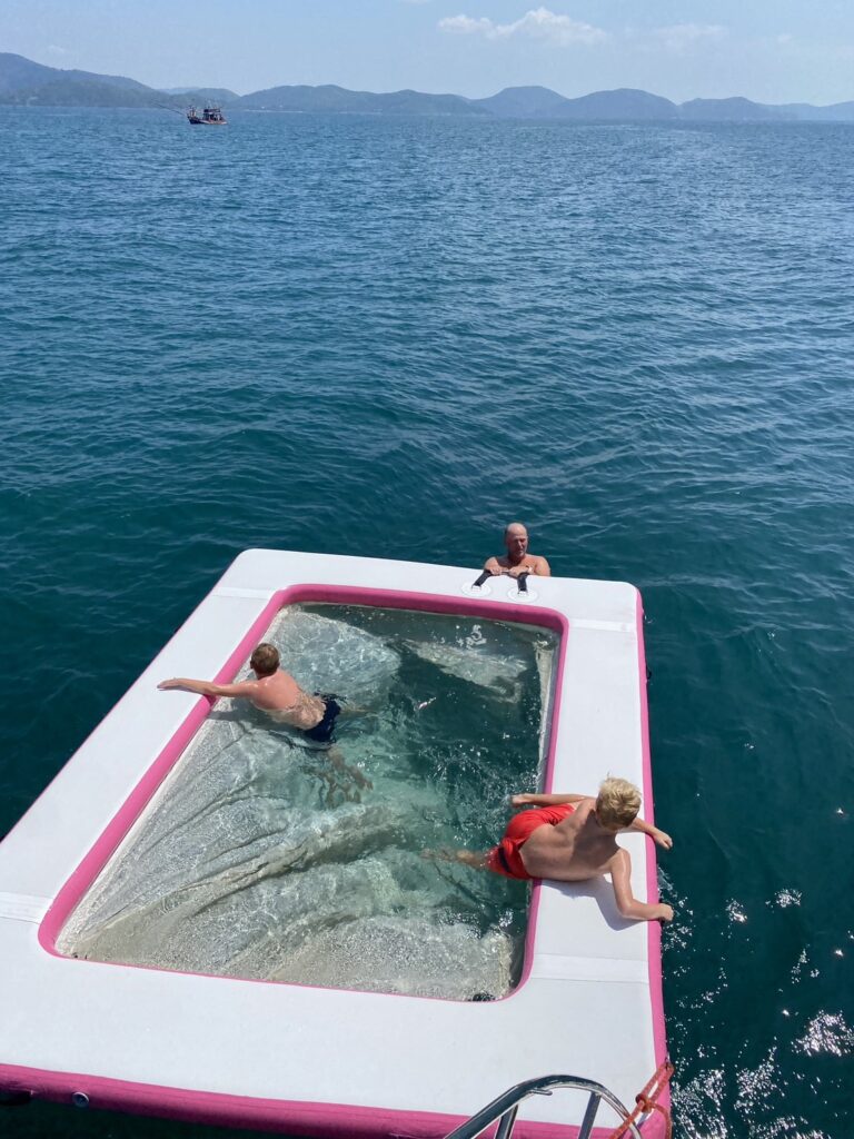 pool with yacht party