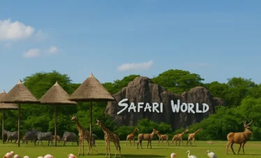 Visitors exploring Safari World Bangkok with animal shows, lush greenery, and a vibrant family-friendly environment.