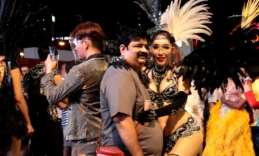 Tourists with Alcazar Performers After the Show