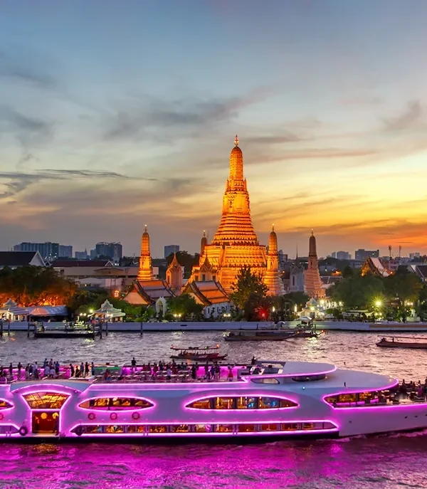 Chao Phraya Dinner Cruise at sunset with Wat Arun