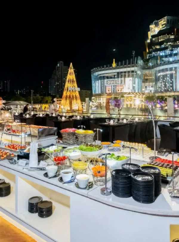 Thai and international buffet setup with elegant dinner tables on Opulence cruise