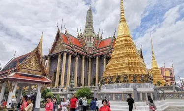 Golden rooftops and detailed architecture of Bangkok's Grand Palace