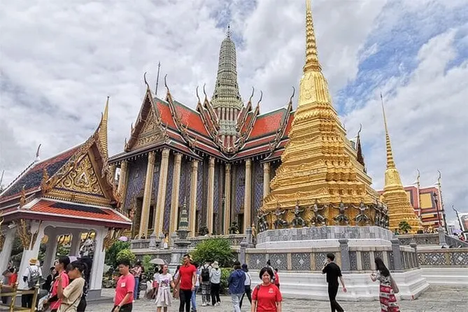 Golden rooftops and detailed architecture of Bangkok's Grand Palace