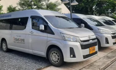 Shared hotel pickup van ready for Ayutthaya cruise guests in Bangkok