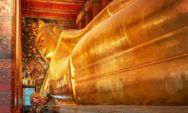 Massive golden Reclining Buddha statue at Wat Pho temple