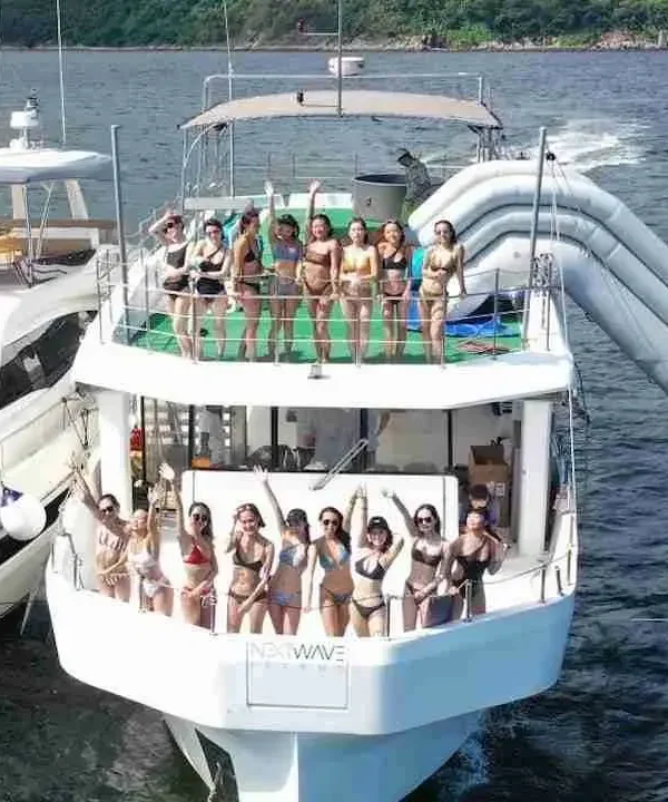 Distant view of Big Daddy yacht party in Pattaya with people enjoying on deck in the sea