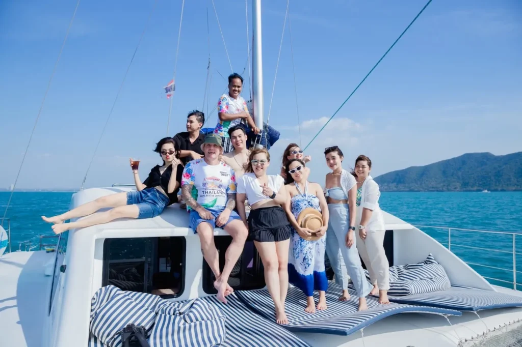 ourists and girls enjoying a lively yacht party on the deck with ocean views