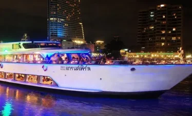 Tourists relaxing on open-air deck of Grand Pearl River Cruise