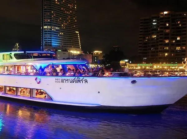 Tourists relaxing on open-air deck of Grand Pearl River Cruise