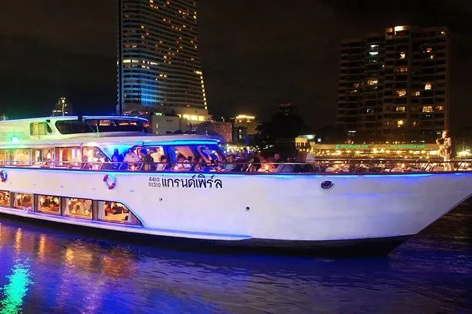 Tourists relaxing on open-air deck of Grand Pearl River Cruise