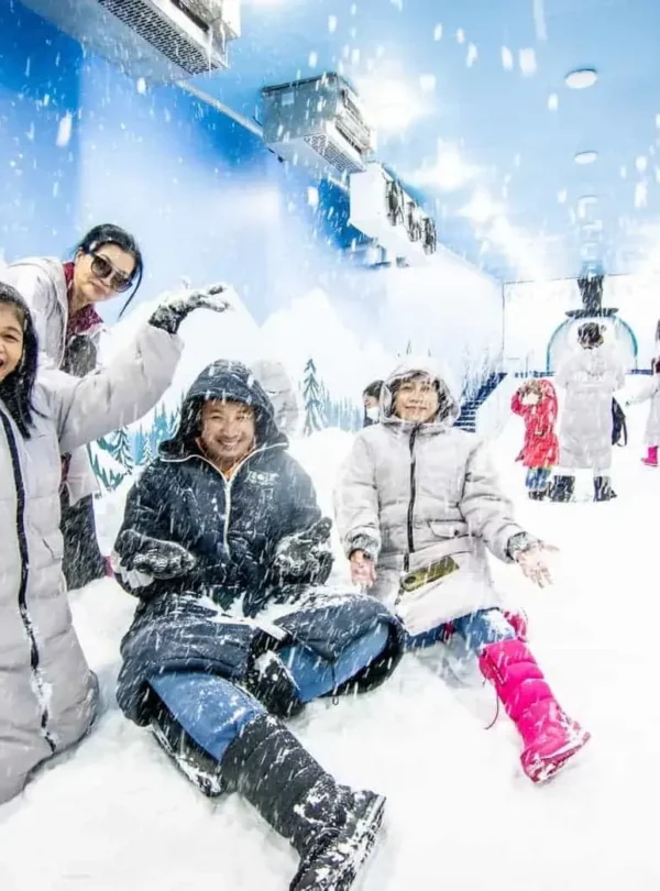 Children playing in the Snow Dome with artificial snow