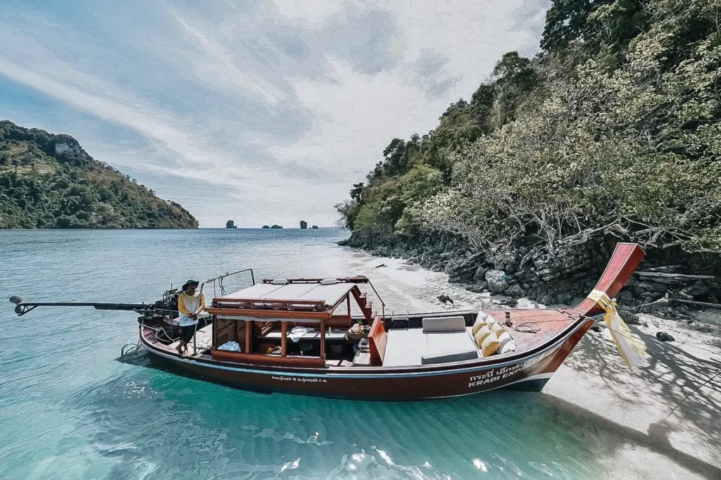 Traditional Thai long tail boat sailing near the 4 Islands in Krabi