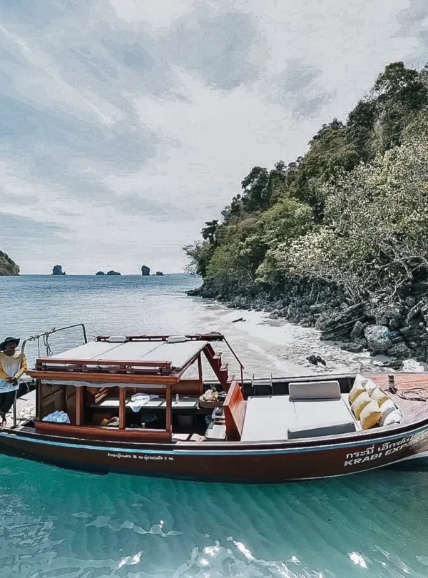 Traditional Thai long tail boat sailing near the 4 Islands in Krabi