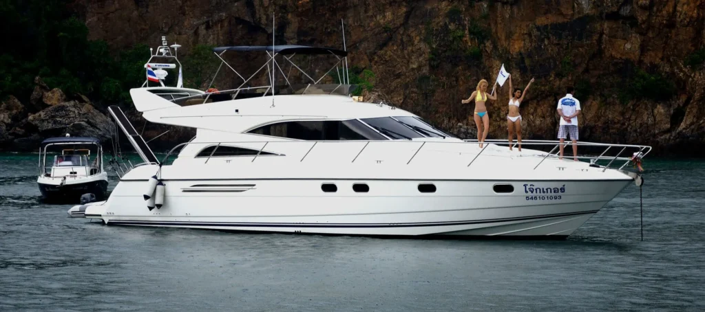 Scenic sea view with people partying on a yacht in Pattaya
