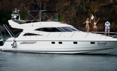 Scenic sea view with people partying on a yacht in Pattaya