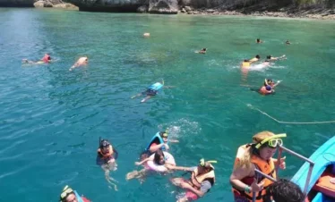 Tourists snorkeling in clear waters during the 4 Islands tour in Krabi