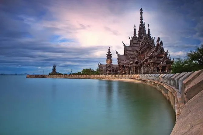 The Sanctuary of Truth Pattaya wooden temple exterior by the sea