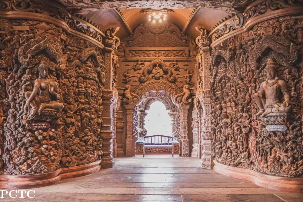 Intricate wood carvings inside The Sanctuary of Truth Pattaya