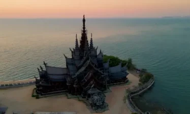 Aerial view of The Sanctuary of Truth Pattaya with sea background