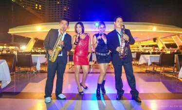 Live music performance during dinner inside Chao Phraya Princess Cruise Bangkok