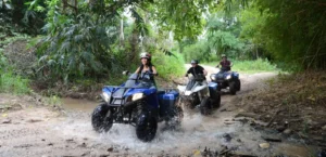 Rider enjoying ATV Kart adventure on muddy trail in Pattaya