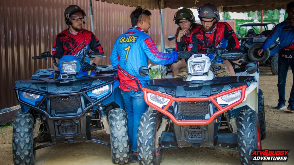 ATV riders receiving safety instructions before ride in Pattaya