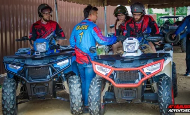 ATV riders receiving safety instructions before ride in Pattaya