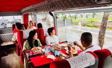 Tourists Dining on Thai Bus Food Tour Bangkok