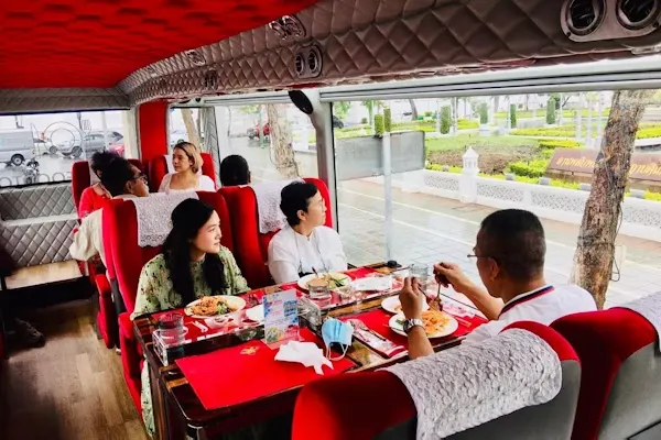 Tourists Dining on Thai Bus Food Tour Bangkok