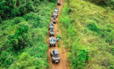 View of forest trail and natural scenery during ATV ride in Pattaya