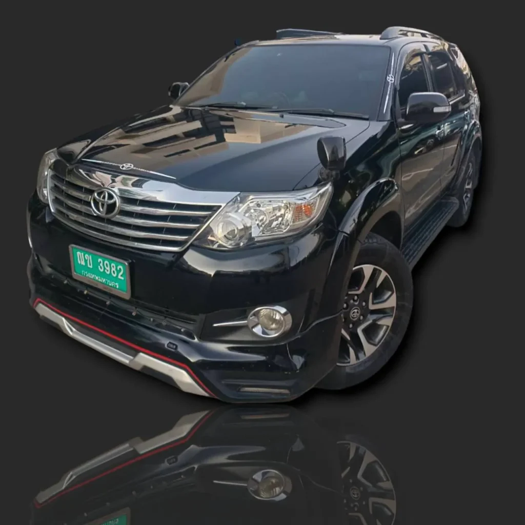 Clean and air-conditioned taxi interior for airport transfer.