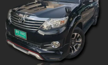 Clean and air-conditioned taxi interior for airport transfer.