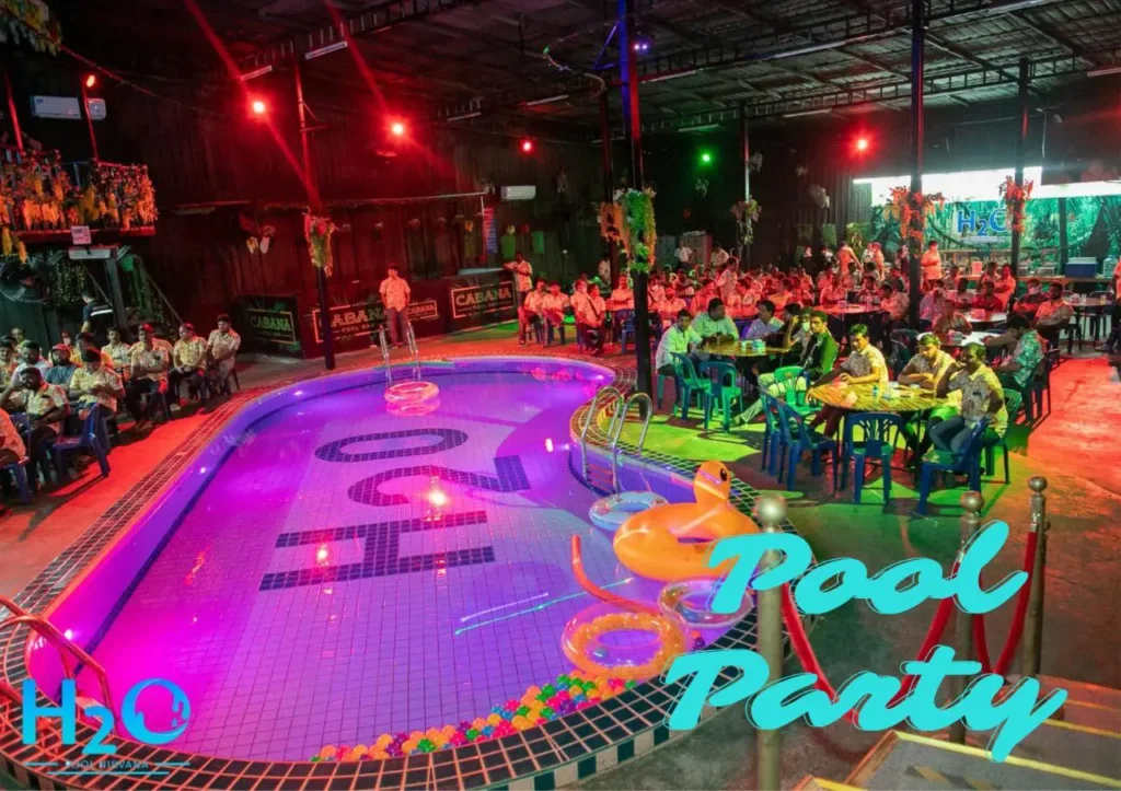 Live DJ spinning music during a pool party at H2O Pool Pattaya