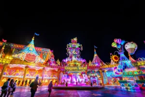 Carnival Magic Phuket night show with illuminated parade, grand stage performance, and vibrant lights
