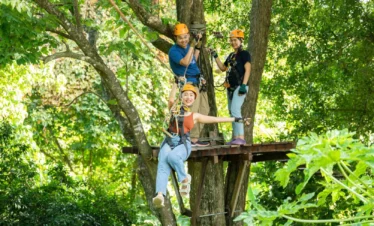 Guests crossing swing bridges during Tarzan Adventure Phuket zipline course