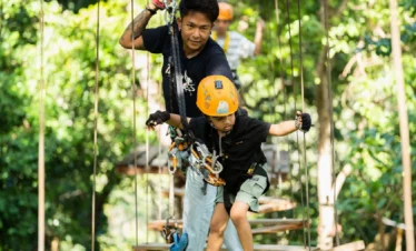 Tarzan Adventure Phuket flying skateboard and rope challenge in jungle setting