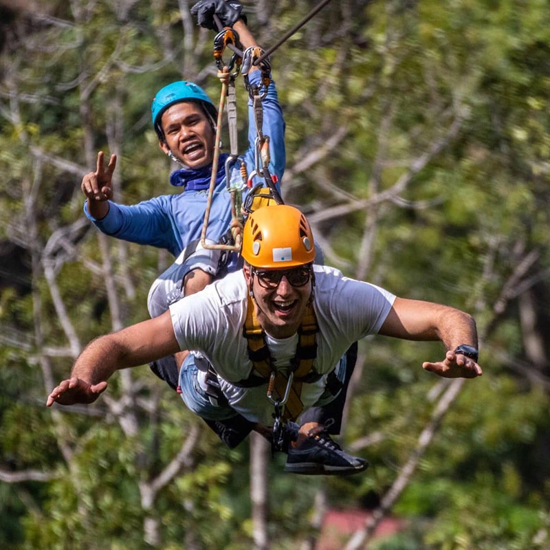 Guests navigating rope challenges at Tarzan Adventure Phuket jungle course