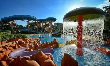 Guests sliding down a water slide at Splash Jungle Water Park Phuket