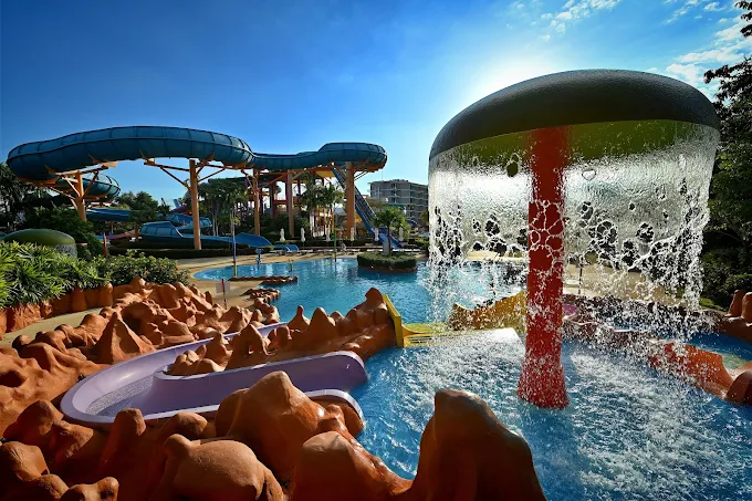 Guests sliding down a water slide at Splash Jungle Water Park Phuket