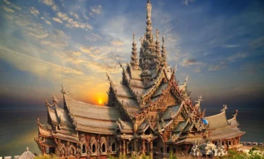 Sanctuary of Truth Pattaya wooden temple with intricate carvings by the sea