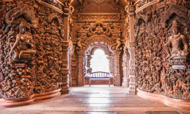 Intricate wooden carvings inside the Sanctuary of Truth Pattaya temple