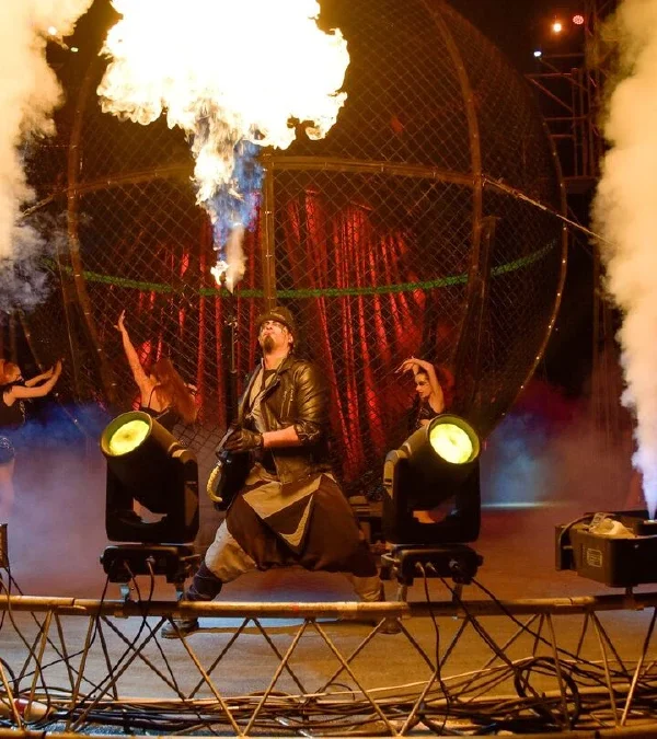 Dramatic stage performance with lights and fire effects at Phuket Circus show in Thailand