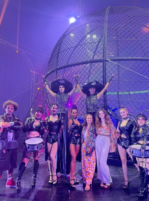 Audience taking picture with artists exciting Phuket Circus live performance in indoor theater