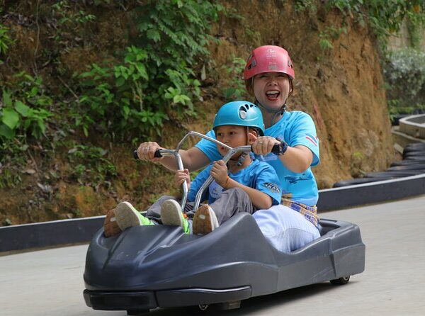 Family enjoying an outdoor mountain cart adventure in Phuket
